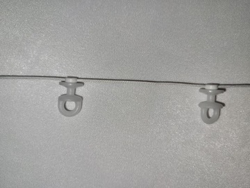 ŚLIZGI NA SZNURKU DO SYSTEMU WAVE-FALA BIAŁE 1:2 ROZSTAW 12/6