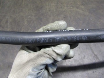 Наливная труба FORD FOCUS II 07-11r 7M519K164AA