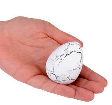 Динозавр вылупляется и растет из яйца, яйцо растет