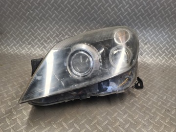 REFLEKTOR LAMPA LEWY ASTRA III H BIXENON SKRĘTNY ORYGINAŁ