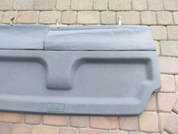 HYUNDAI TUCSON 1 OD 2004-06R. ŠEDÝ POLIČKA BAGAZNIKA.