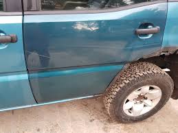 DVEŘE LEVÝ ZADNÍ NISSAN TERRANO II FACELIFT