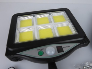 Светодиодный светильник COB, солнечный с датчиком движения и отдельной солнечной панелью.