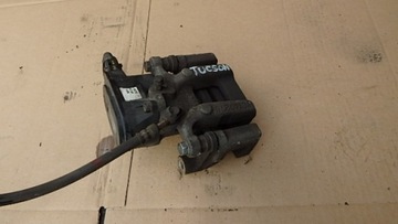 ZACISK HAMULCOWY ELEKTRYCZNY PRAWY TYŁ KIA SPORTAGE IV HYUNDAI TUCSON III