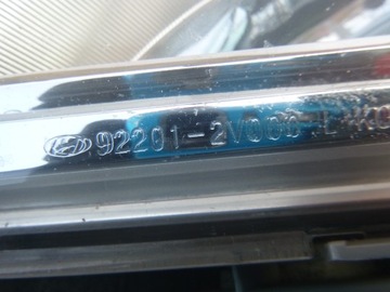 HYUNDAI VELOSTER HALOGEN LEVÝ RÁMEČEK 92201-2V000