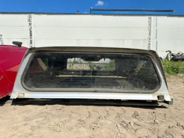 Nissan Navara D40 2008 года выпуска рольставни