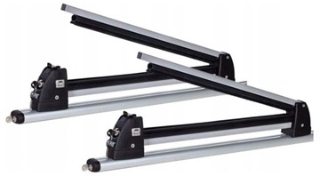 Алюминиевый багажник с запираемым держателем для 3 пар лыж и 2 досок.