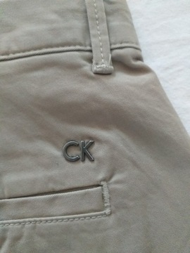 CALVIN KLEIN SPODNIE MĘSKIE W 33 L 32 BEŻOWE