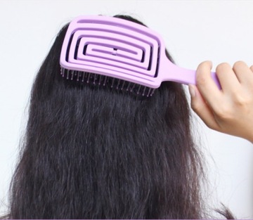 Спиральная массажная щетка для распутывания волос.