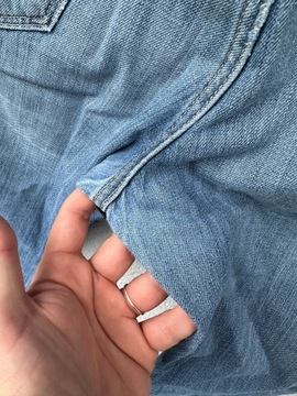 Hugo Boss W33 L32 stylowe błękitne spodnie jeansowe vintage