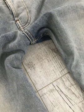TOPMAN dziury kolana rozciągliwe rurki jeans 38 M