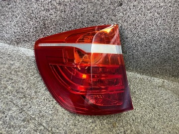 Lampa lewy tyl lewa tylna w blotnik BMW F25 X3 2011' ORYGINALNA