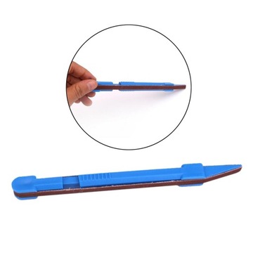 Инструмент для выравнивания концов ладов гитары, напильник.