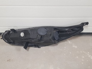 FIESTA MK7 LIFT 13- LAMPA PRAWA LEWA PRZÓD CIEMNA EUROPA WZMOCNIENIE
