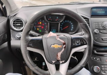 Chevrolet Orlando 1.8 141KM 2012 Chevrolet Orlando 2012r, 1.8 LPG. 7 osob. Uszkodzony lewy bok. Jezdzi., zdjęcie 11