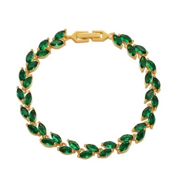 Złota bransoletka z zielonymi kamieniami