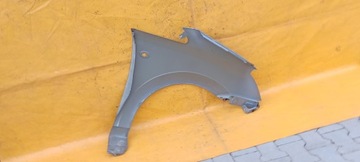 BLATNÍK LEVÝ PŘEDNÍ OPEL MERIVA A 03-06R BARVA MODRÝ .
