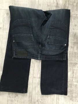 CALVIN KLEIN SPODNIE męskie jeans W32L34 32X32