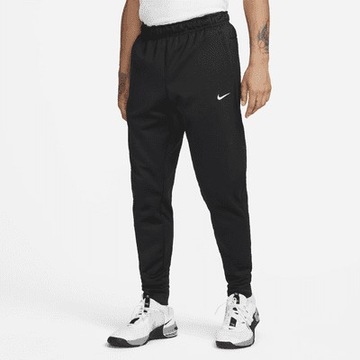 Spodnie dresowe therma zwężane do fitnessu Nike M