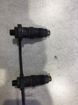 ИНЖЕКТОР MAZDA 323F BJ 2.0 D