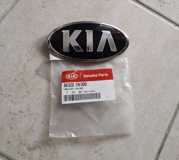 KIA RIO ZNAK KRYT 86320 -1W300
