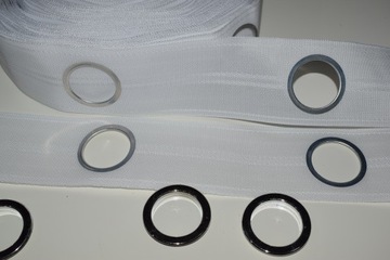 ЛЕНТА ЖЕСТКАЯ С ЛЮСНЯМИ для штор шириной 8см.