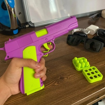 ПИСТОЛЕТ АНТИСТРЕСС ИГРУШКА-СТРЕЛЯТЬ ПИСТОЛЕТ RED V2