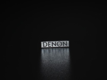 DENON Сменный логотип 35 x 8 мм серебристый