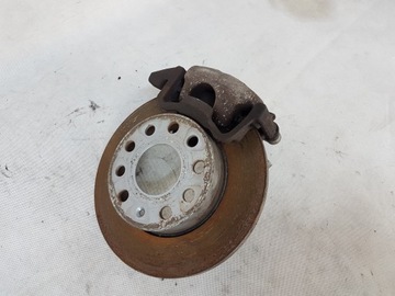 ZACISK HAMULCOWY LEWY PRAWY TYŁ TYLNY VW TOURAN I