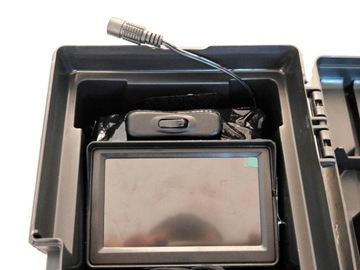 Камера, прикрепленная к Turbospiner Lance для проверки при чистке дымохода.