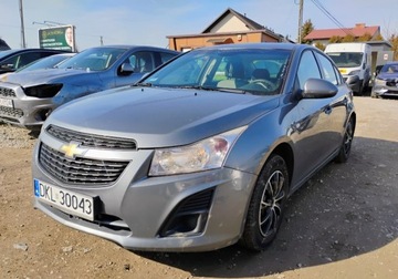 Chevrolet Cruze Sedan 1.8 16V DOHC 141KM 2013 Chevrolet Cruze 2013r, 1.8 Benzyna LPG. Lekko uszkodzony prawy tyl. Jezdz, zdjęcie 1
