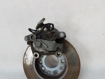 ZACISK HAMULCOWY LEWY PRAWY TYŁ TYLNY VW TOURAN I