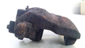 Суппорт тормозной левый передний Nissan Almera N15