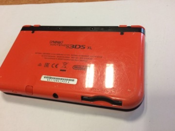 НОВАЯ КОНСОЛЬ NINTENDO 3DS XL ОРАНЖЕВЫЙ И ЧЕРНЫЙ + ЧЕХОЛ С ПИКАЧУ + СТИЛУС + ЗАРЯДКА