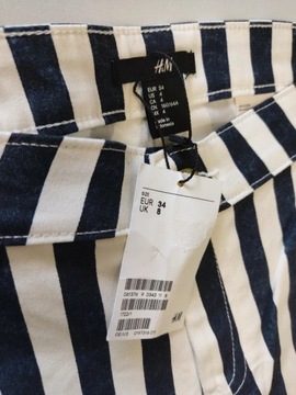 H&M spodnie jeansowe białe pasy długie 34