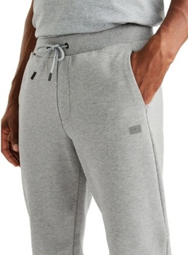 Tommy Hilfiger spodnie dresowe męskie TECH ESSENTIALS SWEATPANT szary r. L