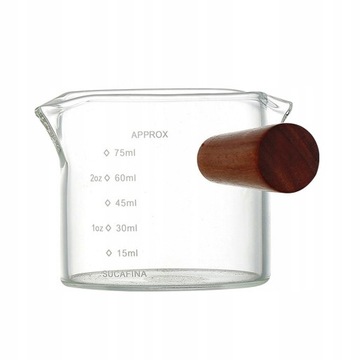 Стеклянный кувшин с мерной чашкой для эспрессо.