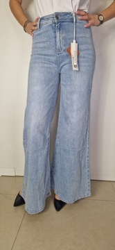 Spodnie Dzwony Damskie Jeansy Wyszczuplające Modelujące roz M