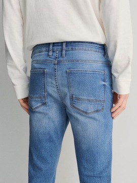 RESERVED DENIM spodnie jeansy efekt sprania skinny 34