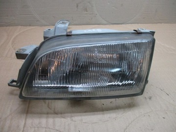 TOYOTA CARINA E 92-97 REFLEKTOR LAMPA PRZÓD