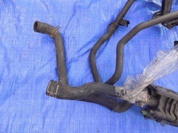 КОРПУС ТЕРМОСТАТА ШЛАНГИ PARTNER BERLINGO III 1.6HD