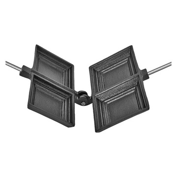 Чугунная сэндвичница над огнем