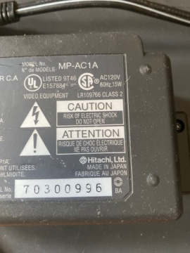 Адаптер зарядного устройства Hitachi MP-AC1A 7В 1,5А и 8,2В 0,5А для фотоаппаратов уникальный