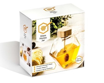 Банка меда с деревянной ложкой