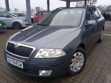 Skoda Octavia II Kombi 1.6 MPI 102KM 2005 Skoda Octavia 1.6 MPI PROSTA benzyna klimatyzacja GRZANE hotele 1.6 Benzyna