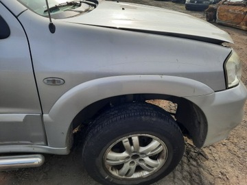 MAZDA TRIBUTE BLATNÍK PRAVÝ PŘEDNÍ