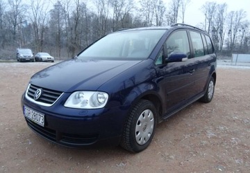 Volkswagen Touran I 1.6 102KM 2006 Volkswagen Touran 1.6mpi,klima,7esosob,hak,zarej 1.6 Benzyna 102KM