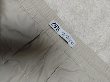 Spodnie materiałowe damskie H&M XL kremowe