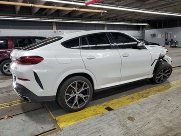 BMW X6 G06 2022 BMW X6 M50i 2022 4.4l 4.4 Benzyna 523KM, zdjęcie 9