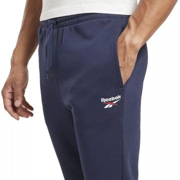 Reebok spodnie bawełniane H49681 100049529 małe logo cienkie joggery r. L